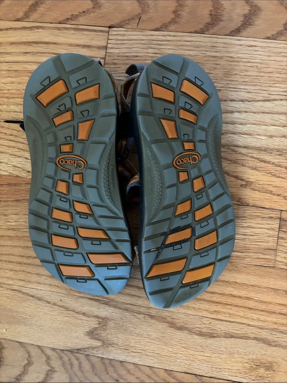 Chaco Black Sandals with Orange and Tan Patterned Straps